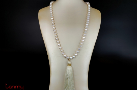 Long pearl necklace with tassel